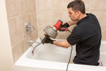 Always Rescue Plumbing Inc Snaking a Clogged Drain in Los Banos